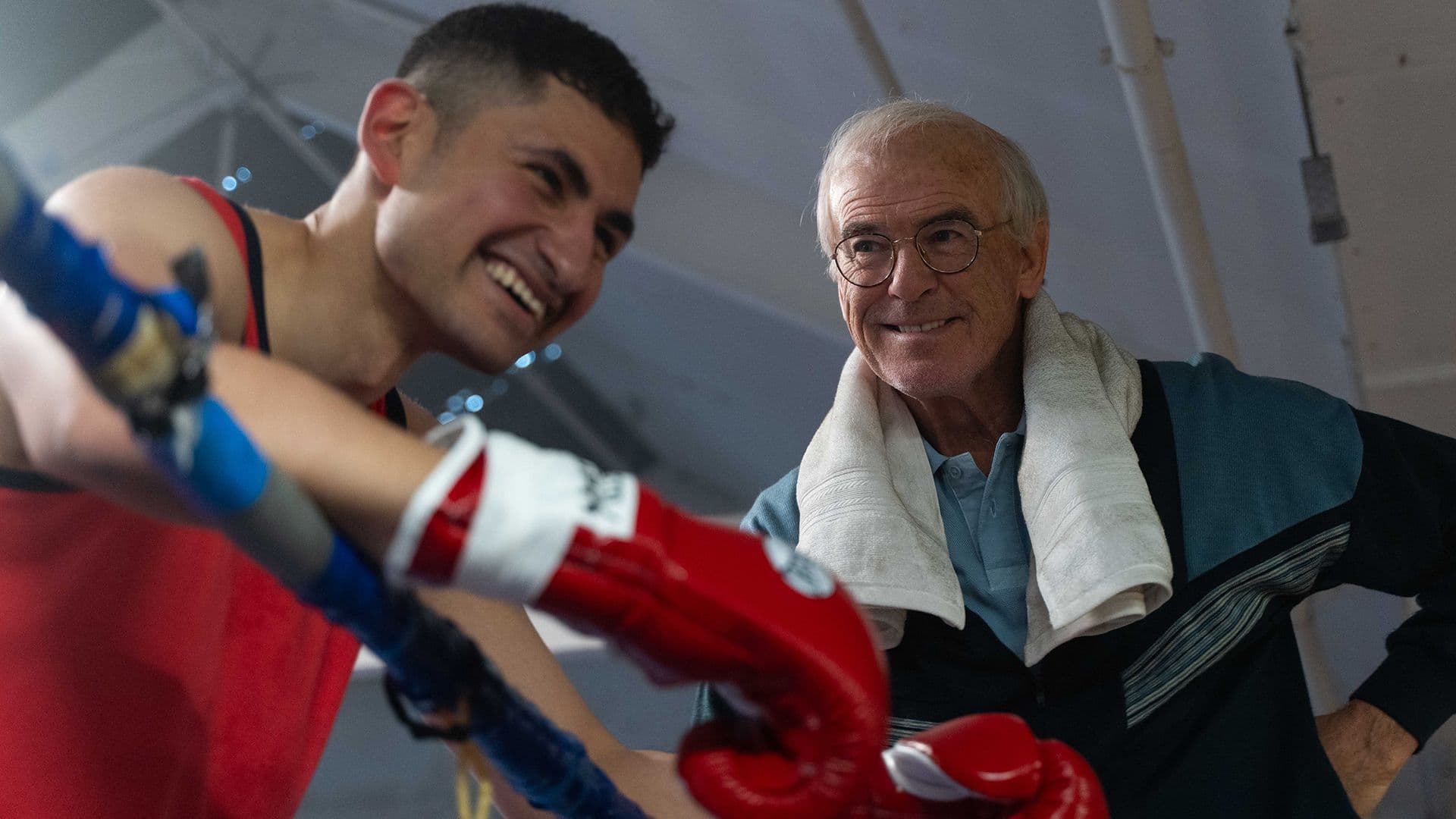 Pierce Brosnan Teaches Young Naz To Fight In Giant Clip cover image