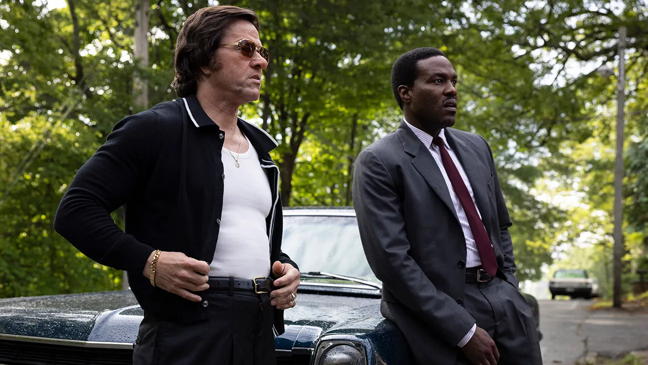 Yahya Abdul-Mateen II and Mark Wahlberg in By Any Means