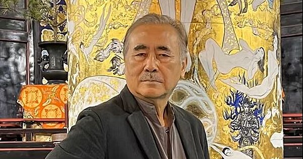 Yoshitaka Amano in an artistic pose