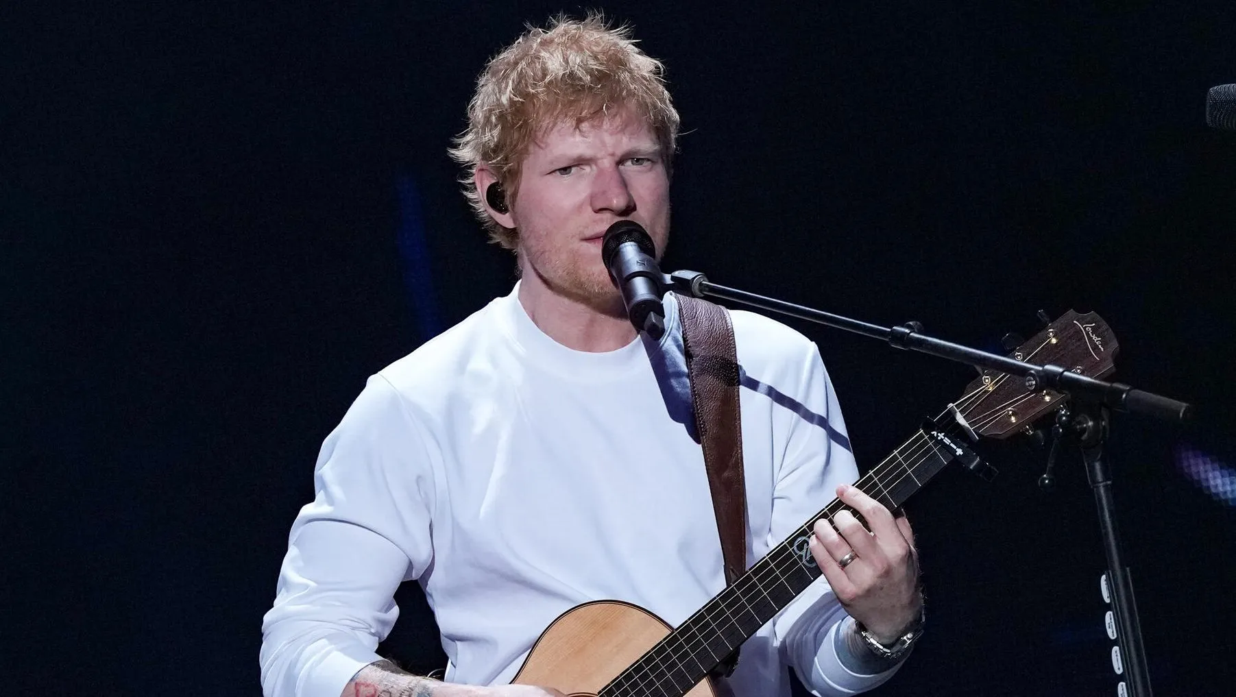 Ed Sheeran performing at a concert in Philadelphia