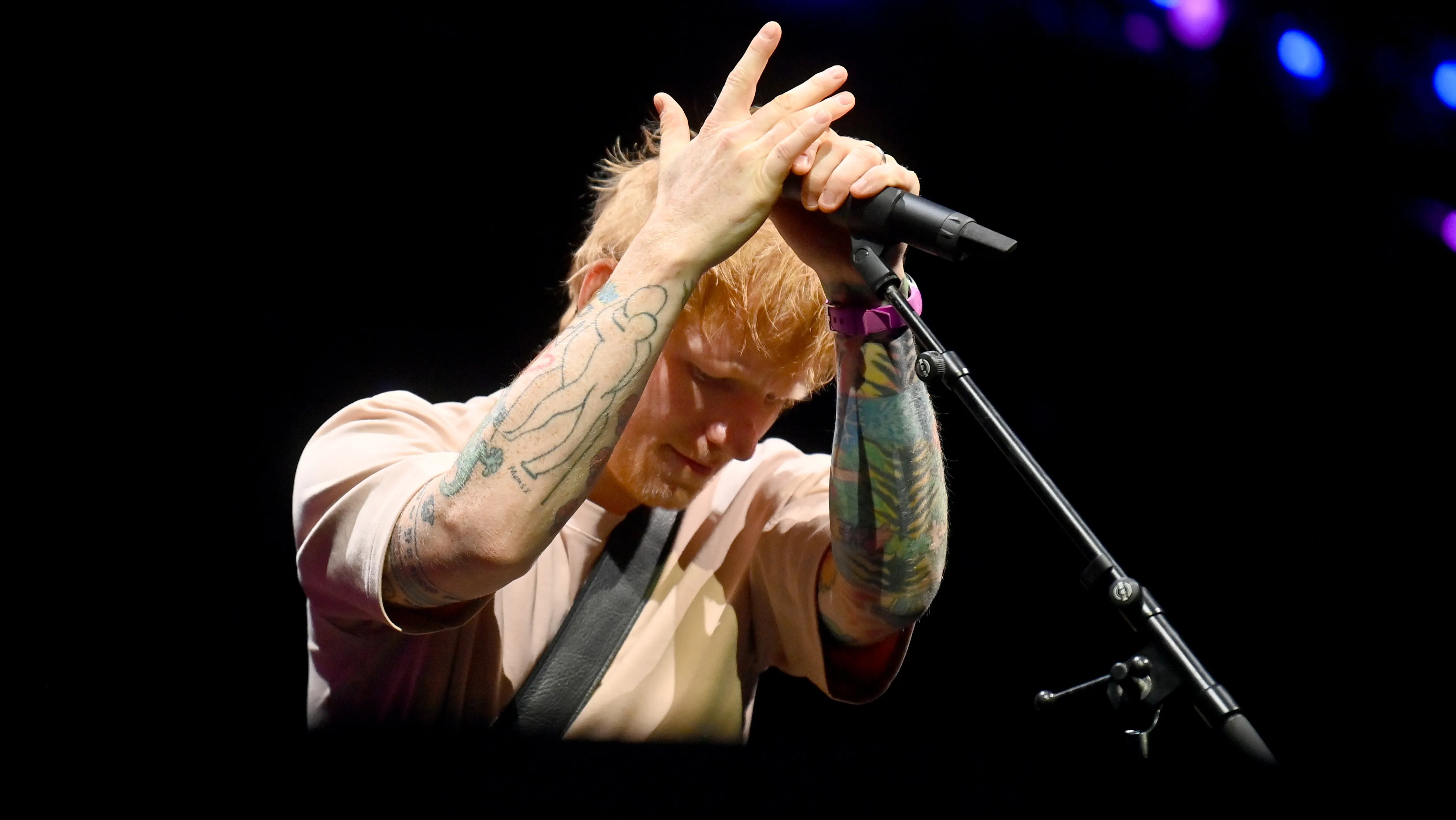 Ed Sheeran concert with protesters outside