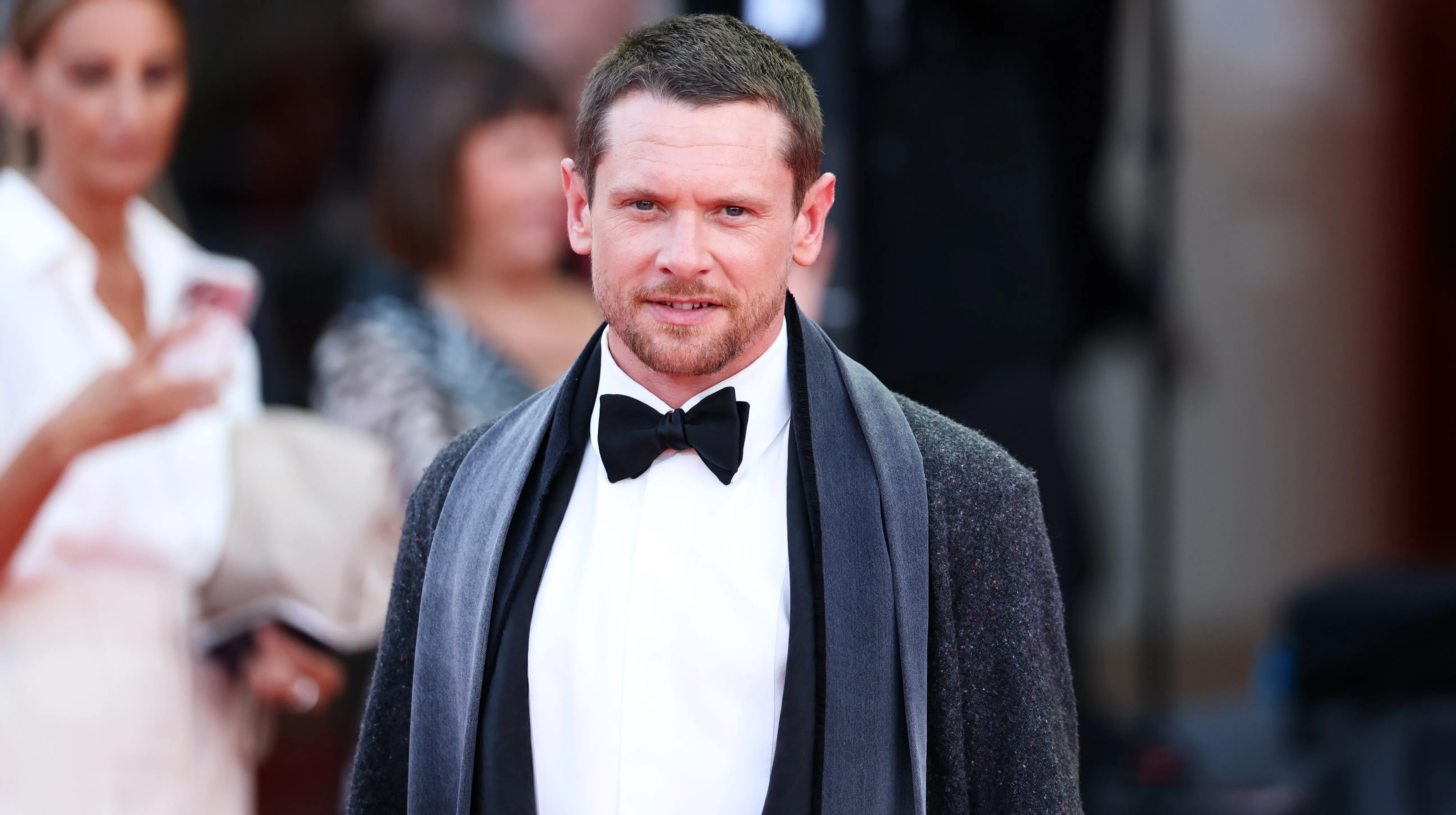 Jack O'Connell wearing a Dior tuxedo at the Venice Film Festival