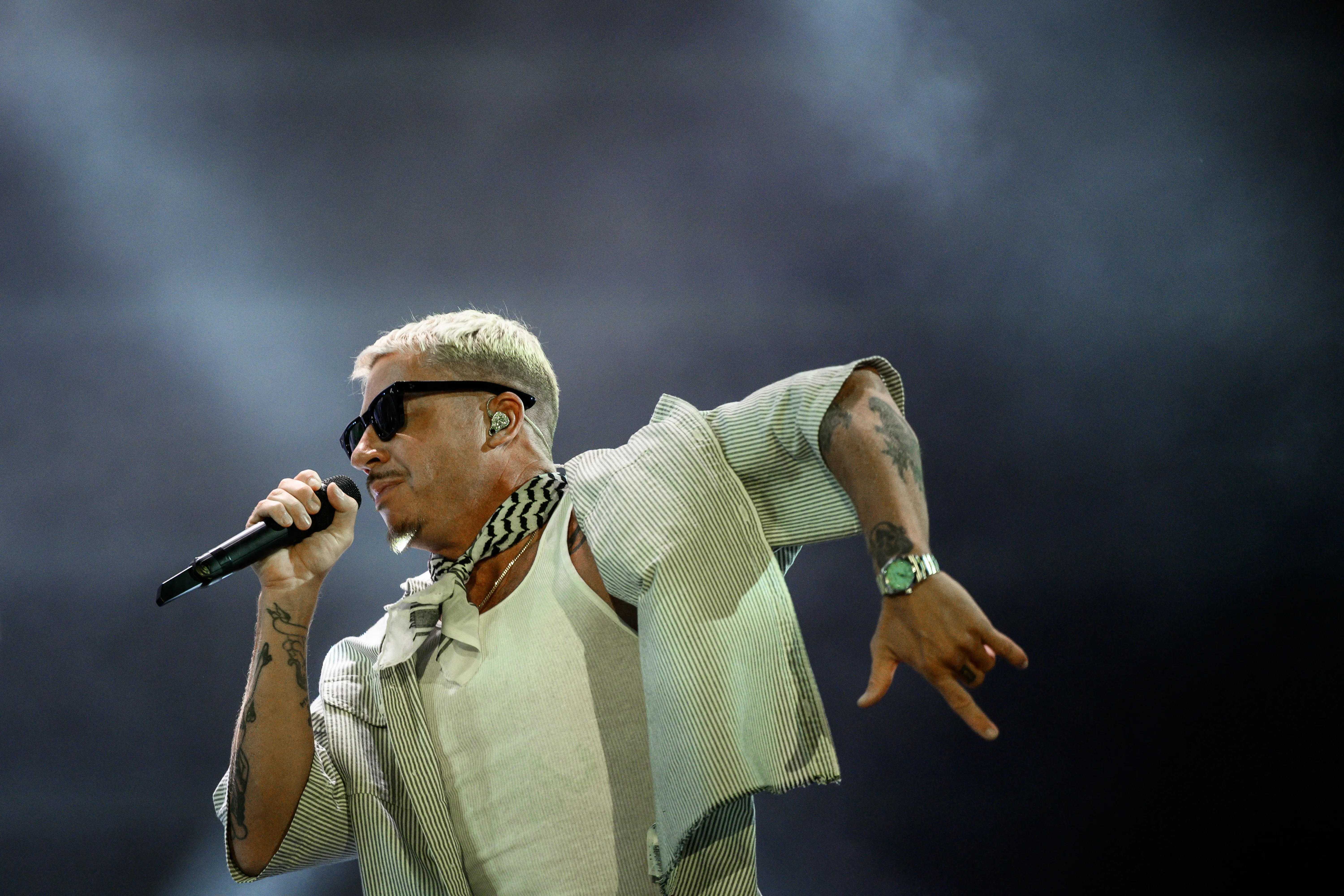 Macklemore Calls Out ‘Free Palestine’ Onstage During Ed Sheeran Tour news cover image