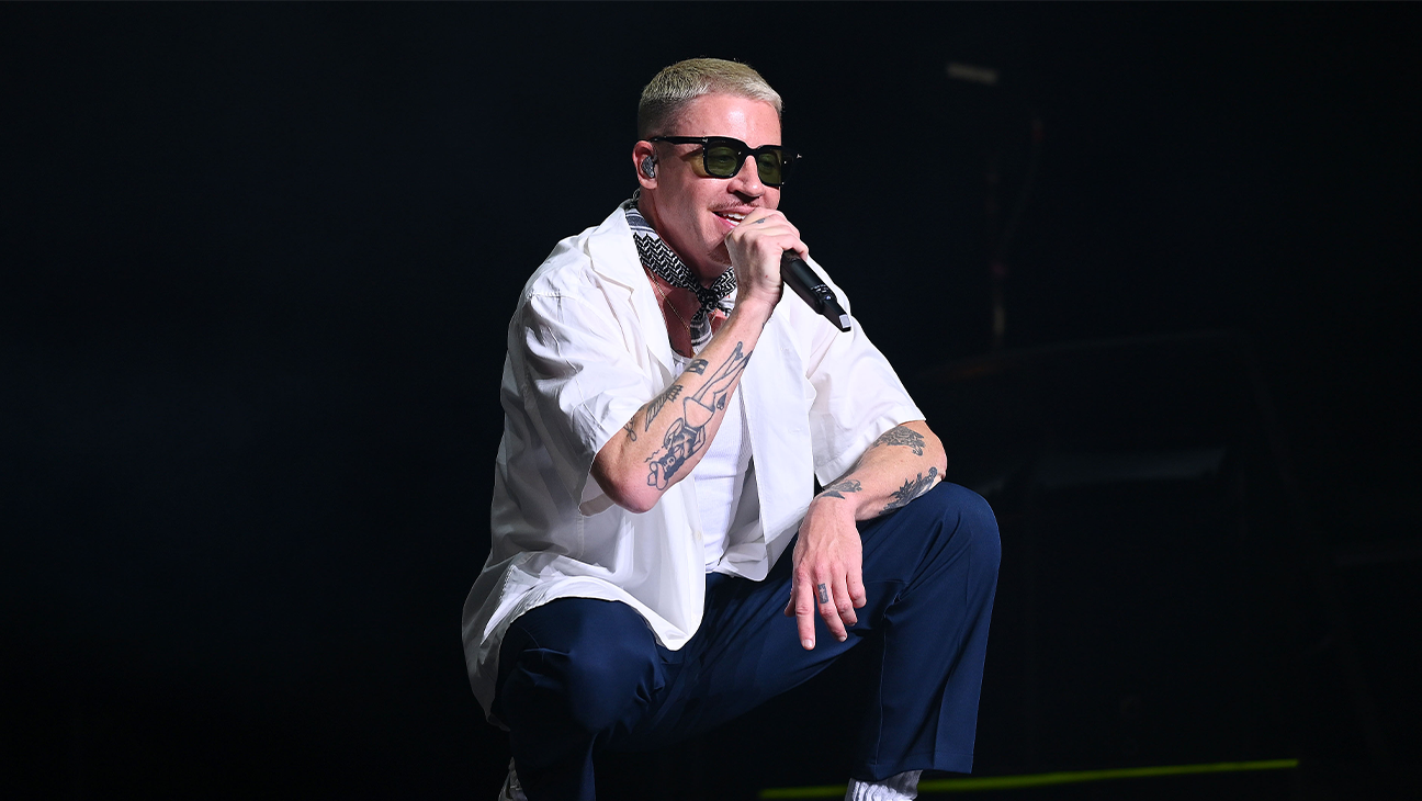 Petition Seeks Macklemore's Removal From Ed Sheeran's Tour After Political Plea news cover image