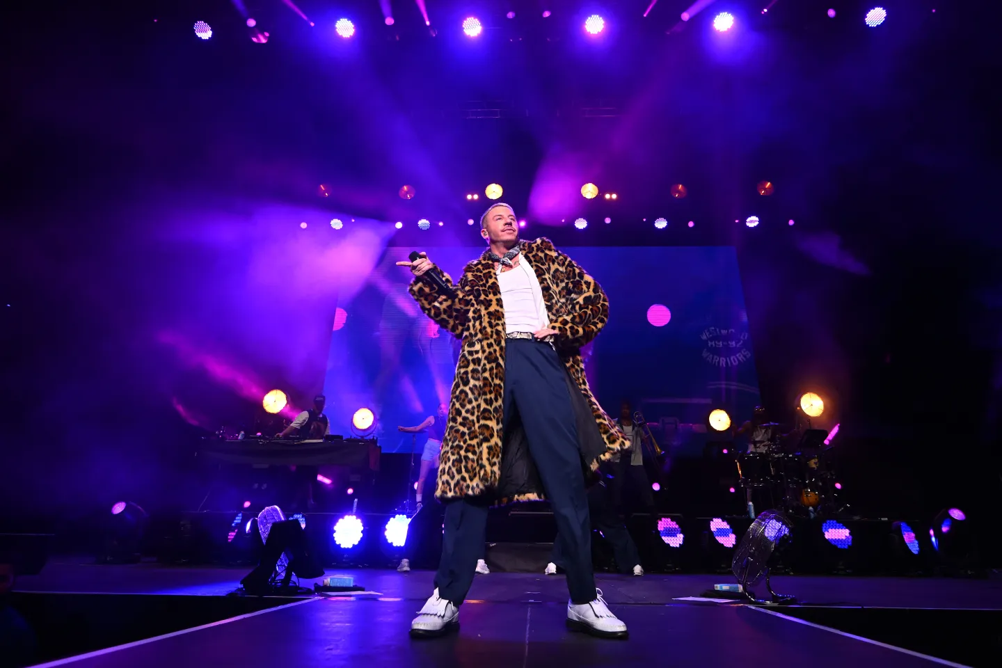 Macklemore Responds After Removal From Ed Sheeran Tour news cover image