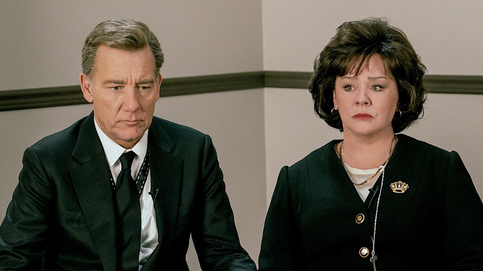 Melissa McCarthy and Clive Owen in character for Netflix series