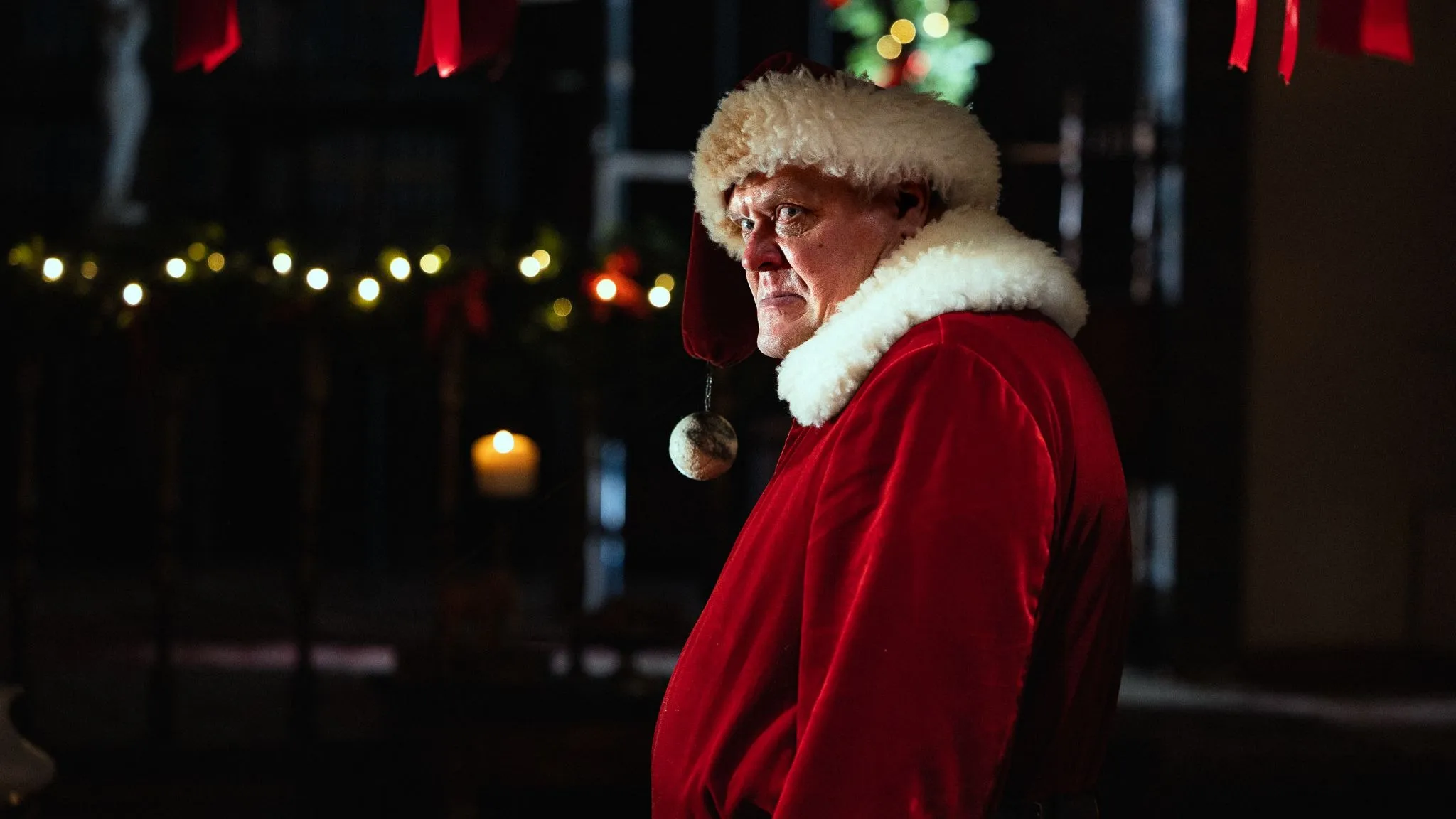 Poster for the horror-comedy Red Snow featuring a vampire Santa
