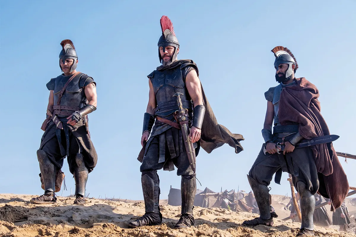 A dramatic scene from ‘The Odyssey’ featuring Matt Damon and epic landscapes