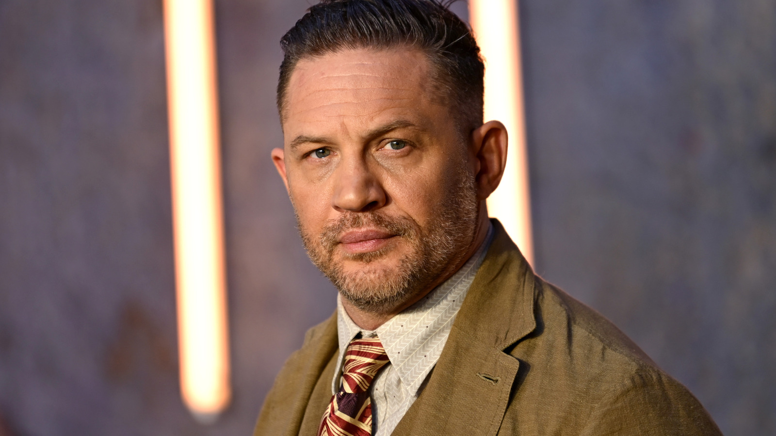 Tom Hardy Reflects on Anticipation Ahead of 'MobLand' Season 2 series cover image