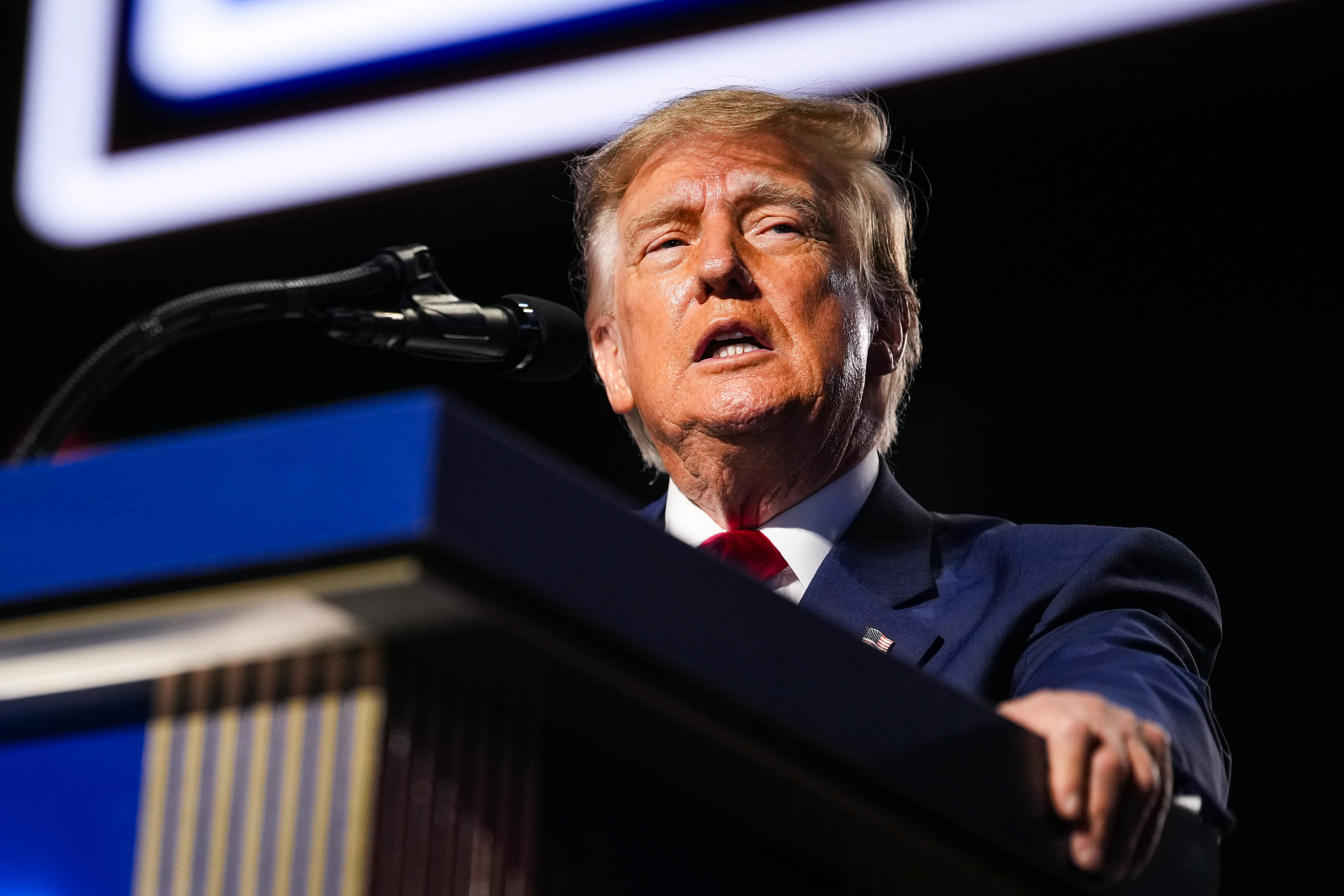 Donald Trump speaking at a press event