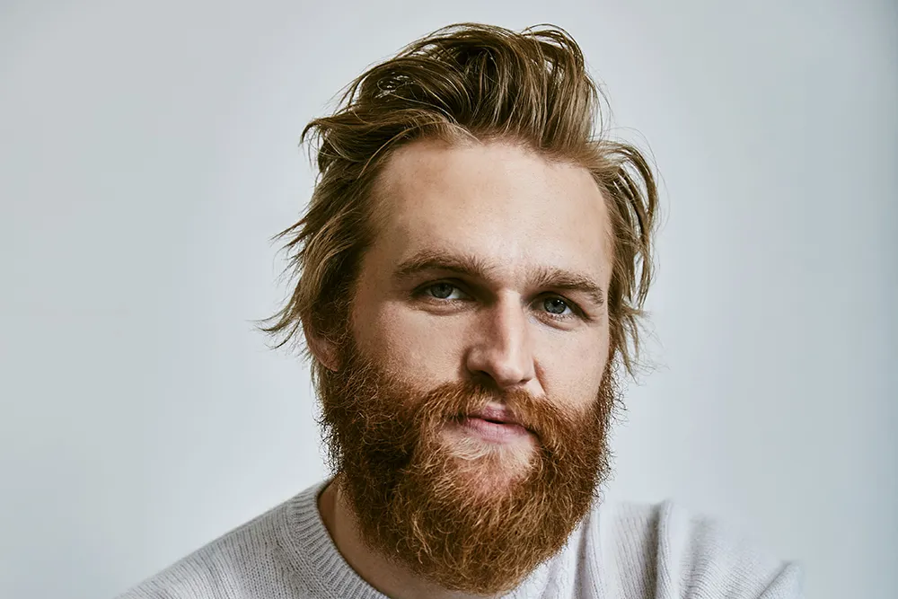 Wyatt Russell Joins Asa Butterfield, Mark Strong and Kyra Sedgwick in John Carroll Lynch Comedy ‘Happy’ news cover image